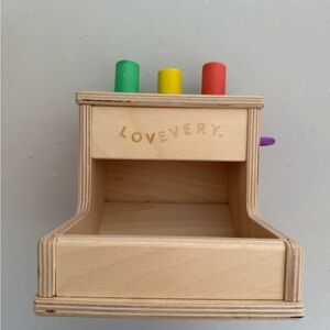 Lovevery Wooden Toy with Colorful Pegs